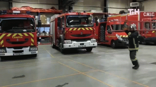 Firefighter Carrying A Ladder GIF