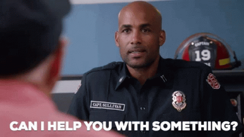 Firefighter Talking to Man