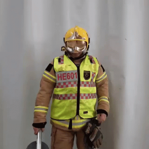Firefighter With Stop Signage GIF