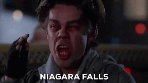 Fireman Holding Walkie Talkie Making Face GIF