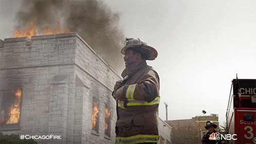 Fireman In Front Of Burning Building #ChicagoFire GIF