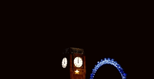 Fireworks Are Displayed In Front Of Big Ben Clock Tower GIF