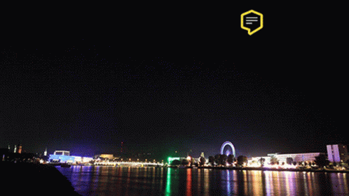 Fireworks Display Over Water With Yellow Speech Bubble GIF