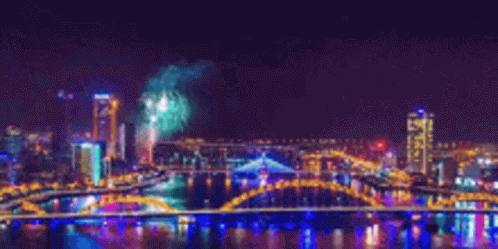 Fireworks Over City Bridge GIF
