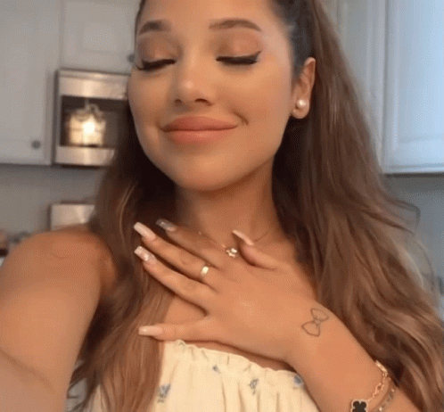 Girl Feeling Grateful And Flattered GIF