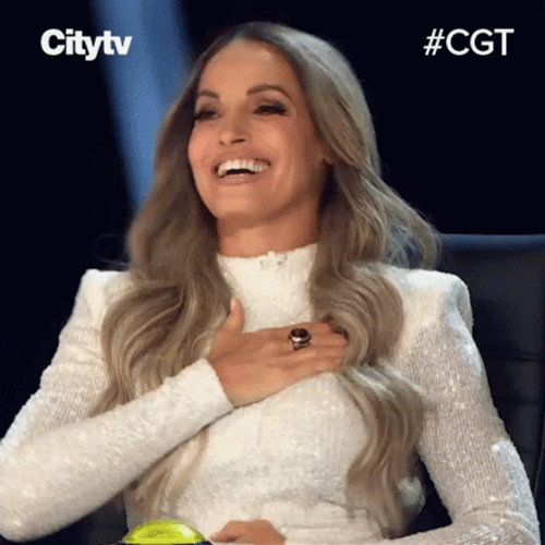 Flattered Trish Stratus GIF