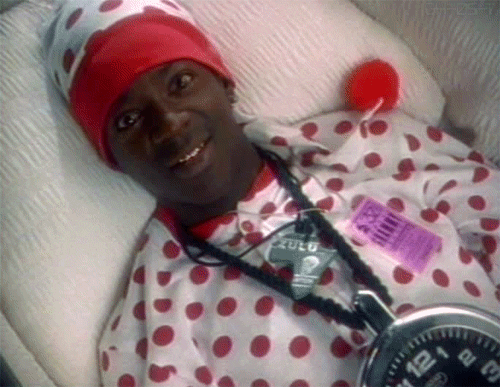 Flavor Flav Lying Down With Moving Eyes GIF
