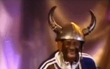 Flavor Flav Wearing A Helmet With Horns GIF