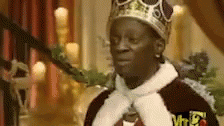 Flavor Flav Wearing Royal Crown And Cape GIF