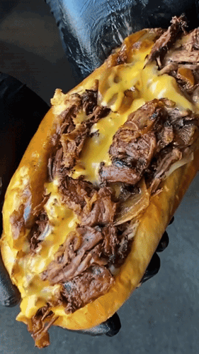 Flexing Long Cheesesteak Brisket GIF