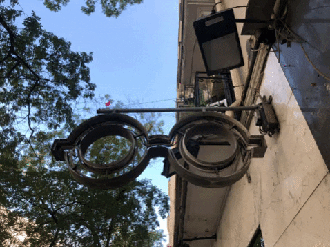 Flickering Happy Sumo Neon Sign GIF