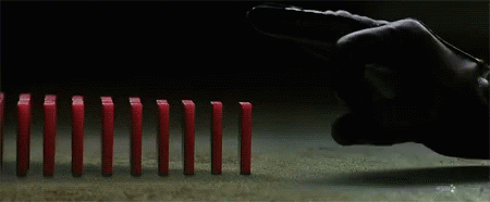 Flicking Red Dominos Falling GIF