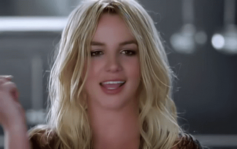 Flirt Britney Spears Touching Lips GIF