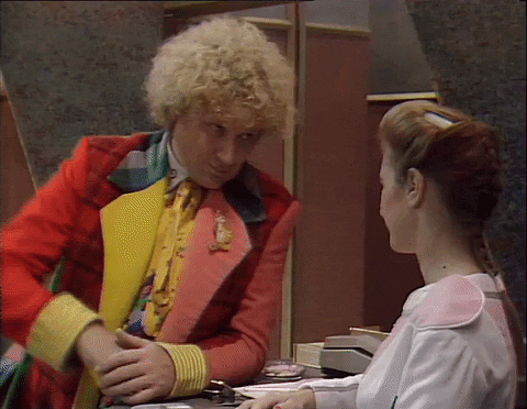 Flirty Colin Baker Flower Magic GIF