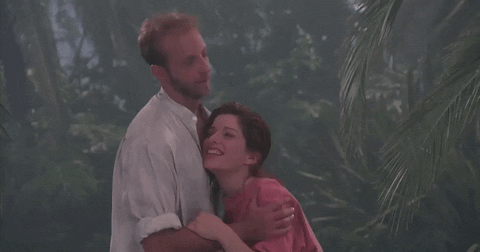 Flirty Couple In Forest GIF