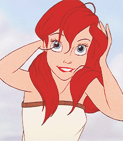 Flirty Little Mermaid Tying Hair GIF