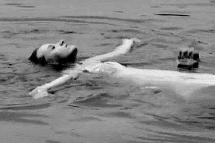 Floating Lady Gets Hug From Behind GIF