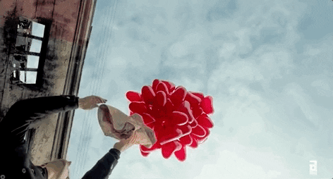 Floating Red Balloons GIF