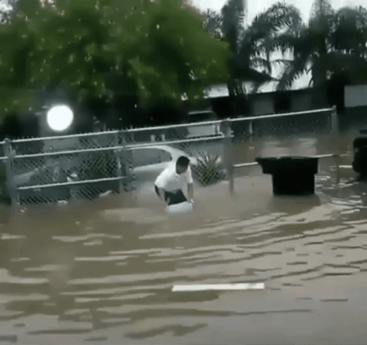 Flood Indonesia Boy Funny Throwing Water GIF