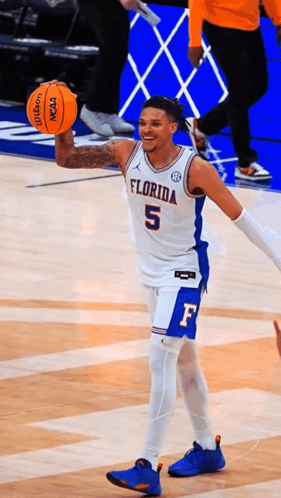 Florida Basketball Player Holding Orange Wilson GIF