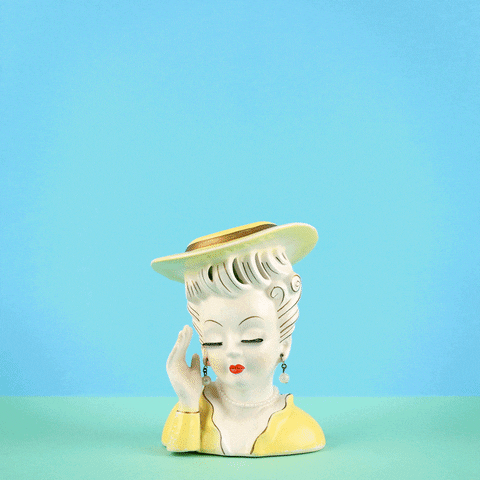 Flowers Woman Head Vase GIF