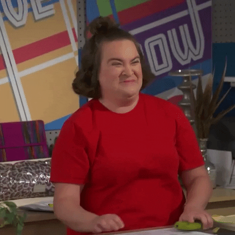 Flustered Woman In Red Shirt GIF