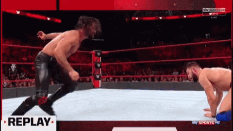 Flying Curb Stomp Of Seth Rollins GIF