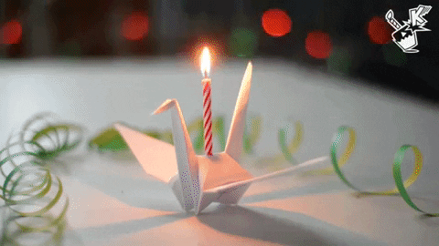 Folded Paper Art Of Origami With Candle GIF