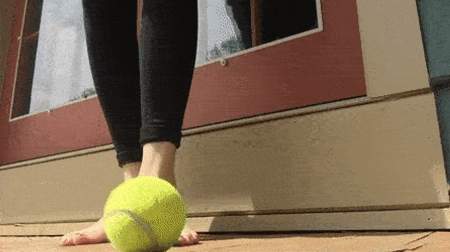 Foot Massage Tennis Ball GIF