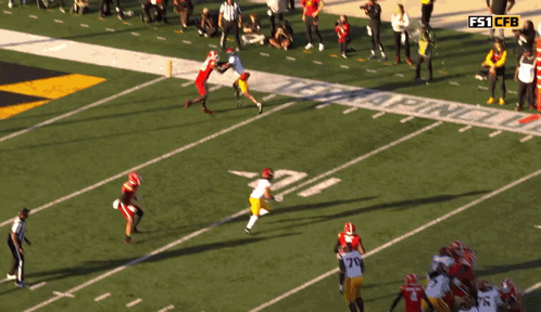 Football Game In Front Of Texas A & M Banner GIF