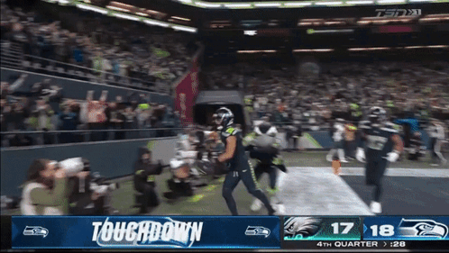 Football Game Scoreboard Says Touchdown