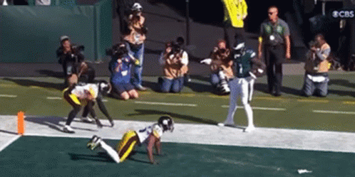 Football Game With CBS Sign GIF