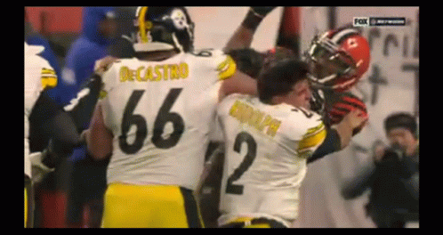 Football Player 66 Being Tackled