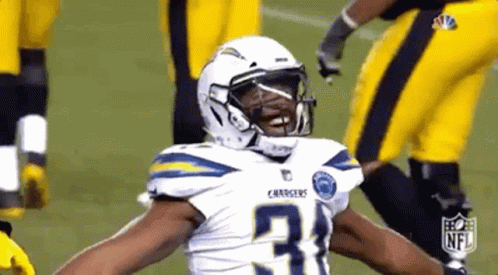 Football Player Arms Outstretched White Helmet Number 31 Jersey GIF