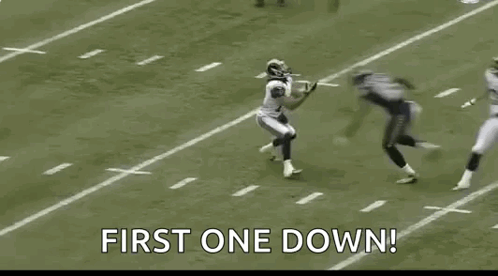 Football Player Being Tackled