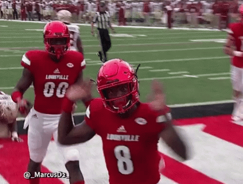 Football Player Celebrating Touchdown