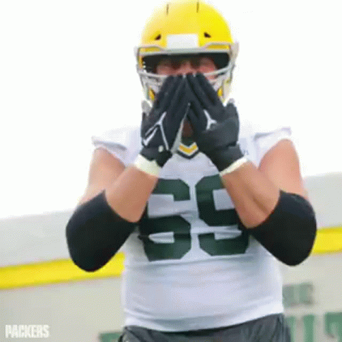 Football Player Covering Mouth GIF