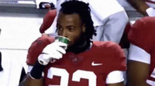 Football Player Drinking From Cup In Red Jersey 25 GIF