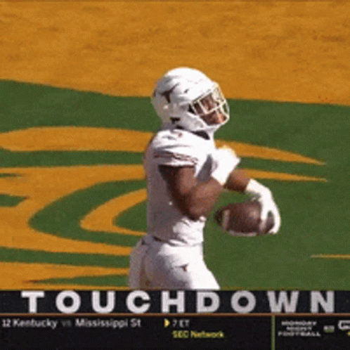 Football Player Holding Football GIF