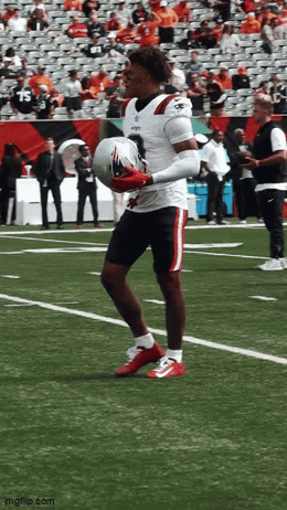Football Player Holding Helmet With Imgflip Watermark