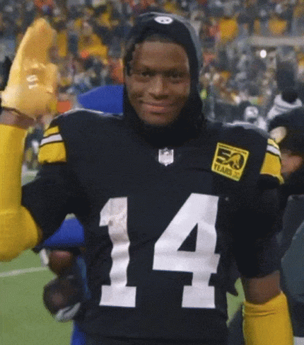 Football Player In Black And Yellow Giving Thumbs Up GIF
