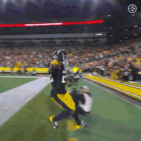 Football Player In Black And Yellow Uniform Number 20 GIF