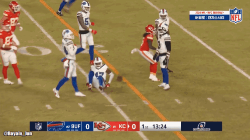 Football Player in Blue #15 Jersey Running
