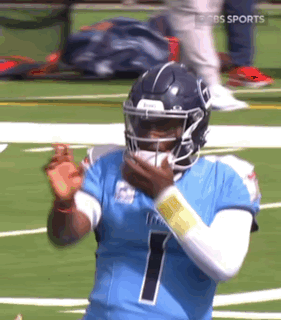 Football Player In Blue Jersey And Helmet GIF