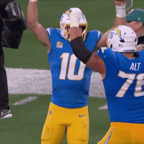 Football Player In Blue Jersey Number 10 GIF