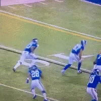 Football Player in Blue Jersey Number 13