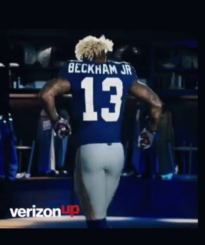 Football Player in Blue Jersey Number 13
