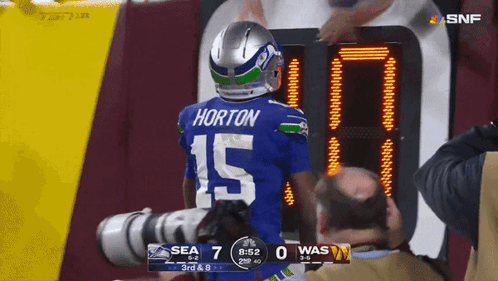 Football Player In Blue Jersey Number 15 GIF