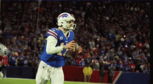 Football Player In Blue Jersey Number 4 GIF