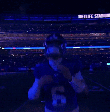 Football Player in Blue Jersey Number 6